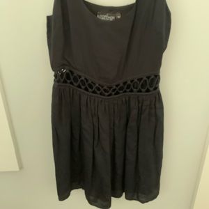 Classic black dress with modern cut outs size 4